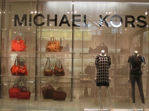 Michael Kors to close up to 125 stores as luxury retail woes deepen